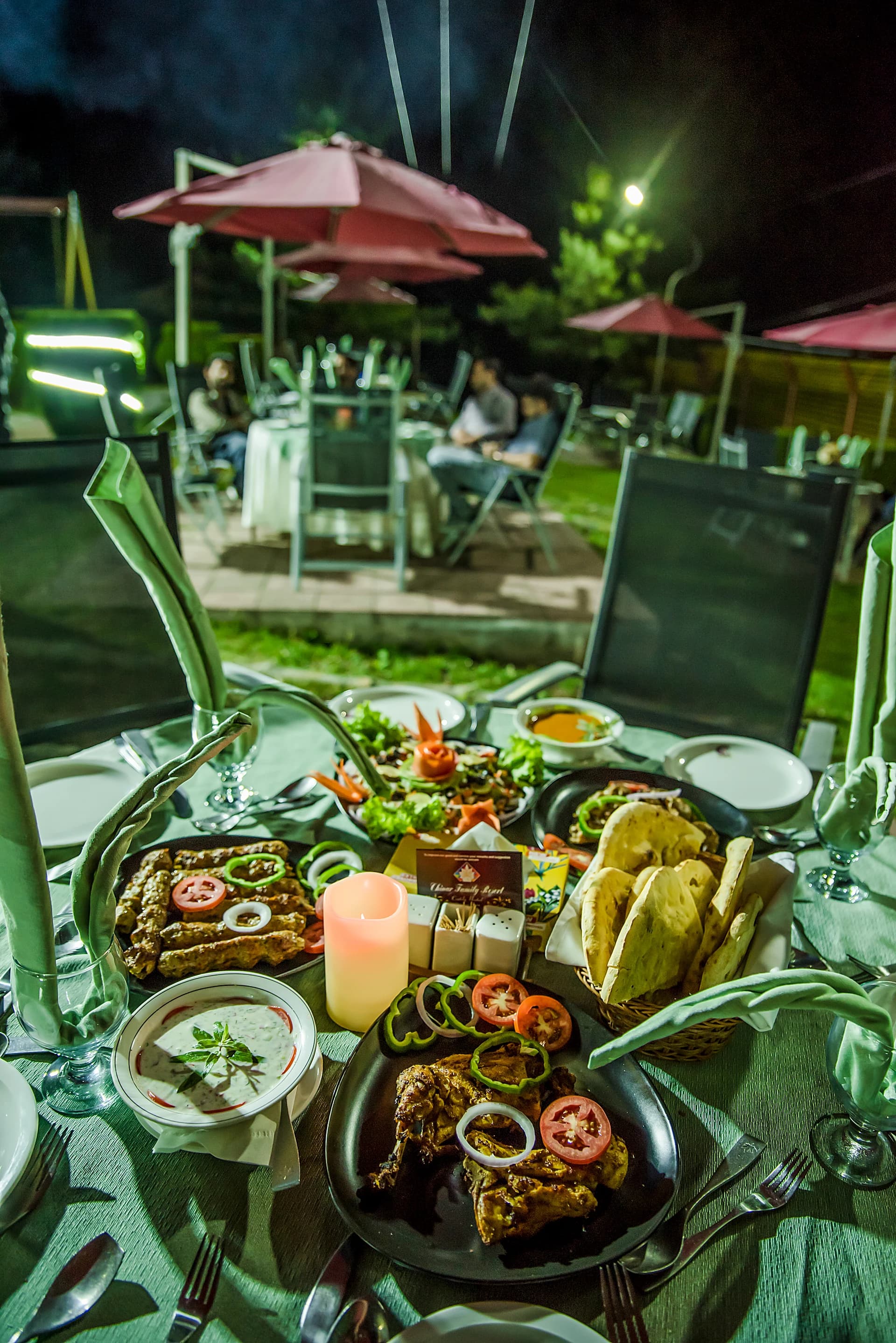 An evening gathering at Chinar Resort