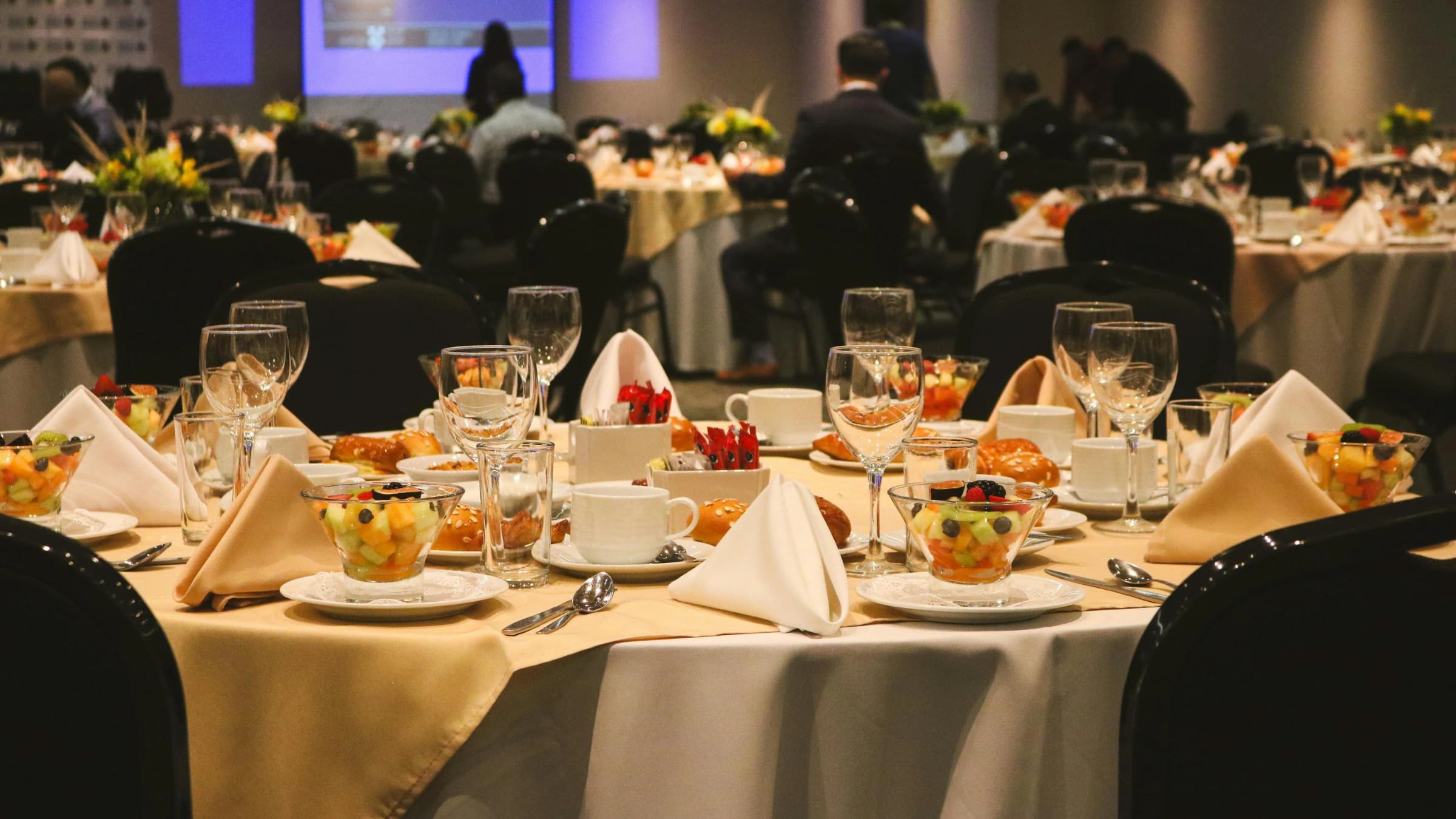 A banquet hall set for a corporate breakfast at Royal Swiss Lahore