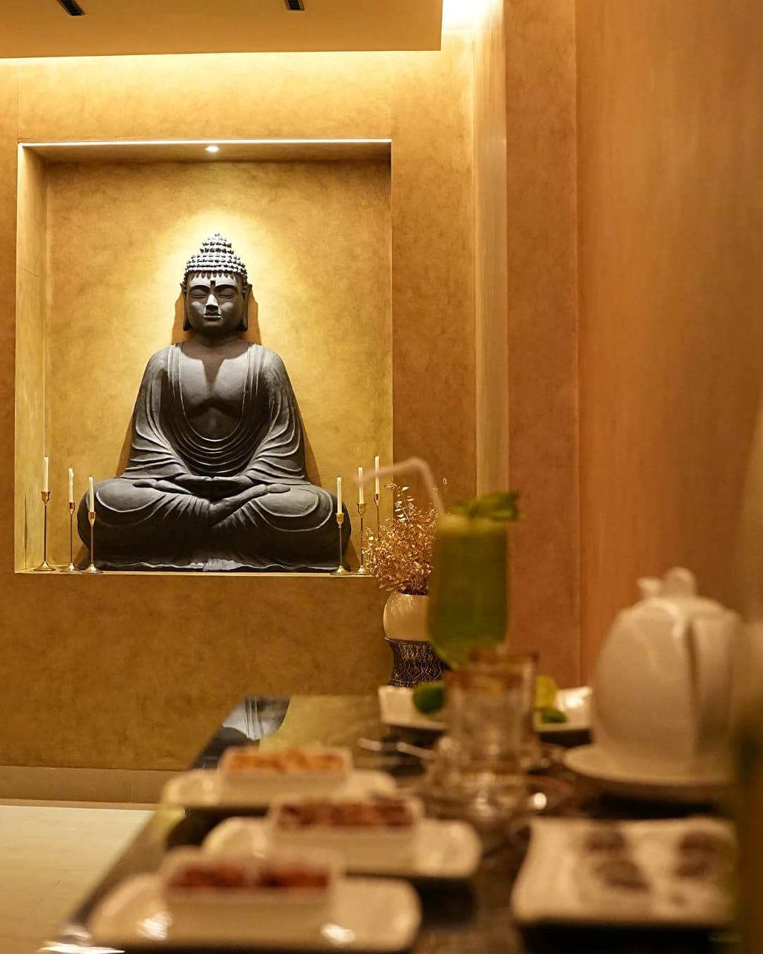 A serene Buddha statue in the spa at Royal Swiss Lahore